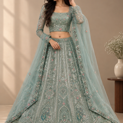 Ruchi powder blue Jimichoo lehenga choli set with mirror embellishment and silver threadwork full front view